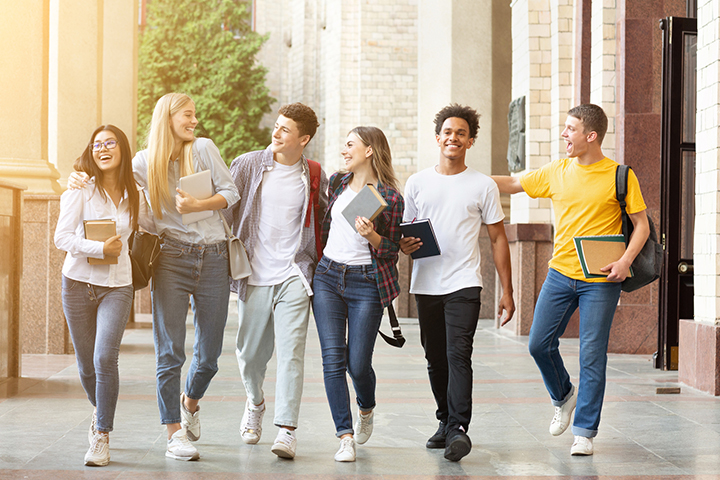 Group of students walking cheerfully