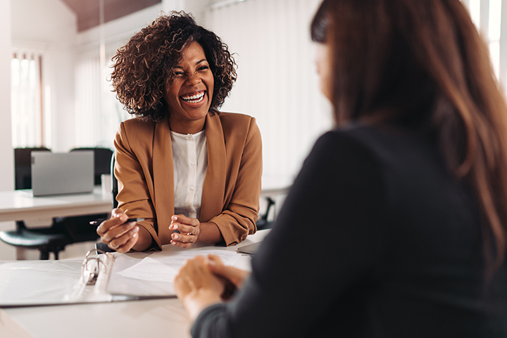 female worker engaging with a customer in an office setting