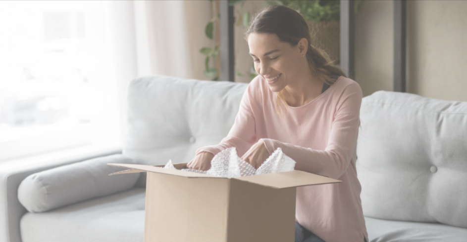 woman opening a box