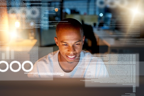 man using computer in office