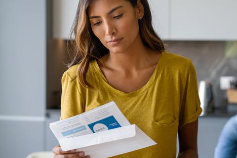 woman-reading-mail