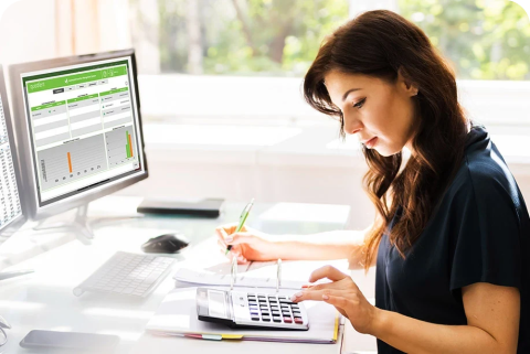 a woman using a calculator